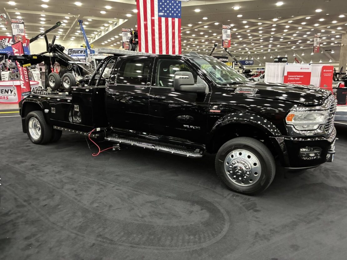 right side angle of a black tow truck at the american towman show in baltimore