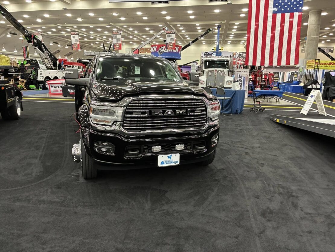 front angle of a black tow truck at the american towman show in baltimore